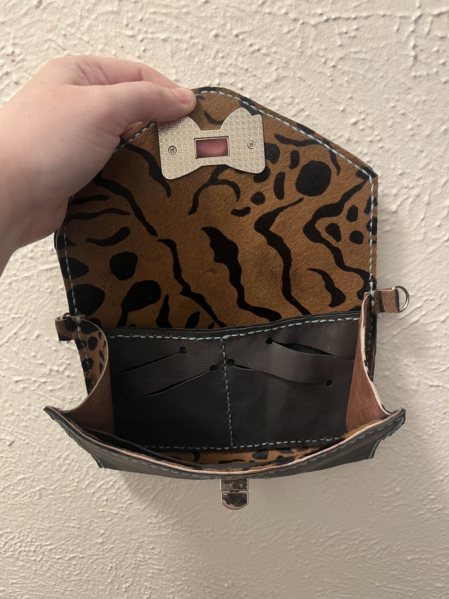 The Bow and Claw Clutch